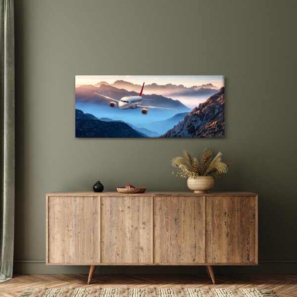 Tablou - Avion peste crestele montane (120x50 cm)