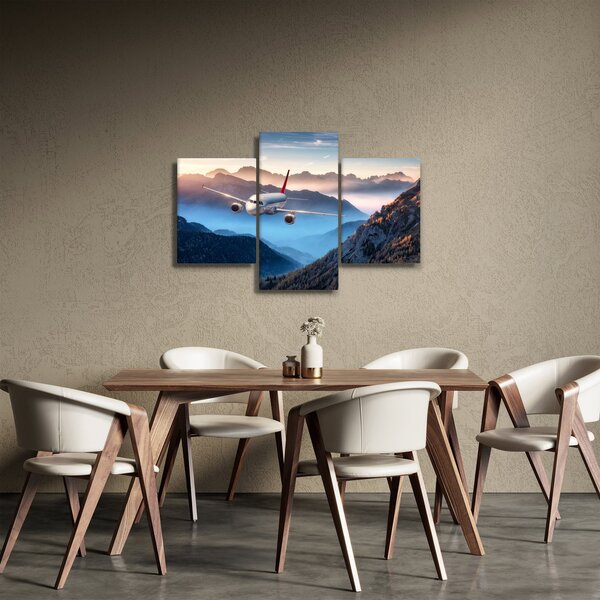 Tablou - Avion peste crestele montane (90x60 cm)