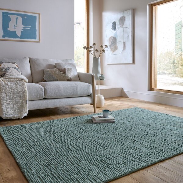 Covor albastru prăfuit țesut manual din lână 120x170 cm Harris Boucle – Flair Rugs