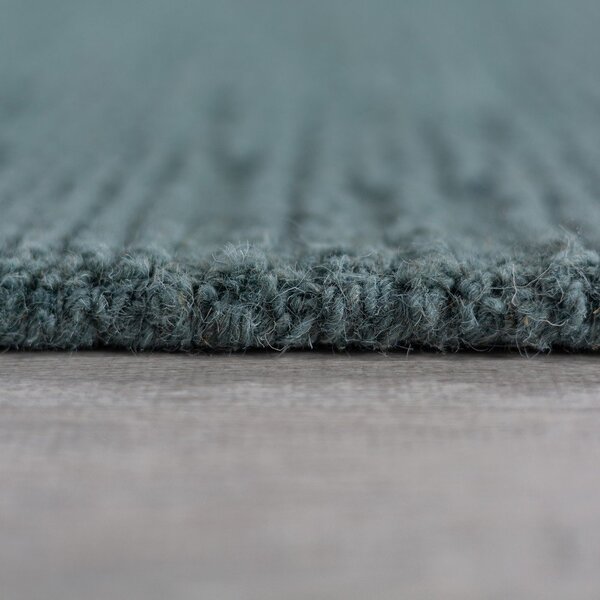 Covor albastru prăfuit țesut manual din lână 120x170 cm Harris Boucle – Flair Rugs