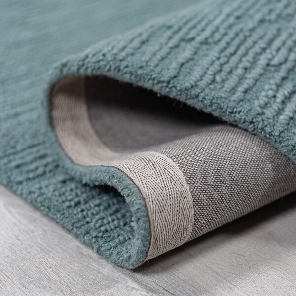 Covor albastru prăfuit țesut manual din lână 120x170 cm Harris Boucle – Flair Rugs
