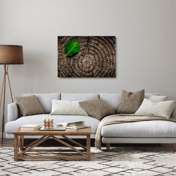 Tablou pe sticlă cu frunză pe trunchi de copac (70x50 cm)