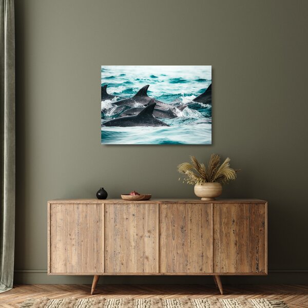 Tablou pe sticlă - Delfini în ocean (70x50 cm)