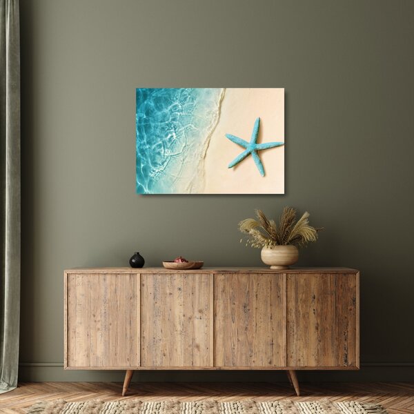 Tablou pe sticlă - Stea de mare pe plajă (70x50 cm)