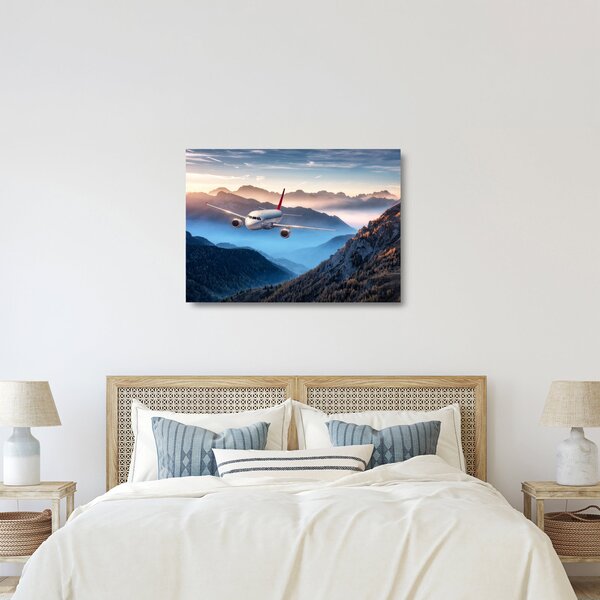 Tablou pe sticlă - Avion peste crestele montane (70x50 cm)