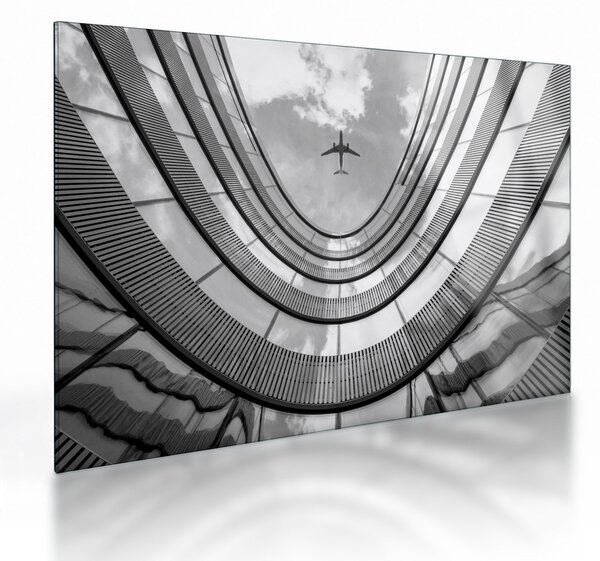 Tablou pe sticlă - Avionul deasupra clădirii (70x50 cm)