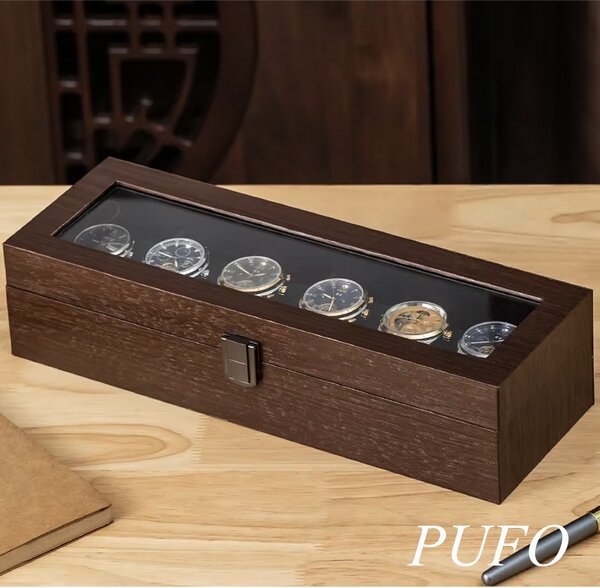 Cutie organizatoare Pufo Luxury pentru 6 ceasuri, caseta eleganta cu capac transparent, 6 compartimente individuale cu pernute, interior negru, pentru depozitare si expunere ceasuri, maro