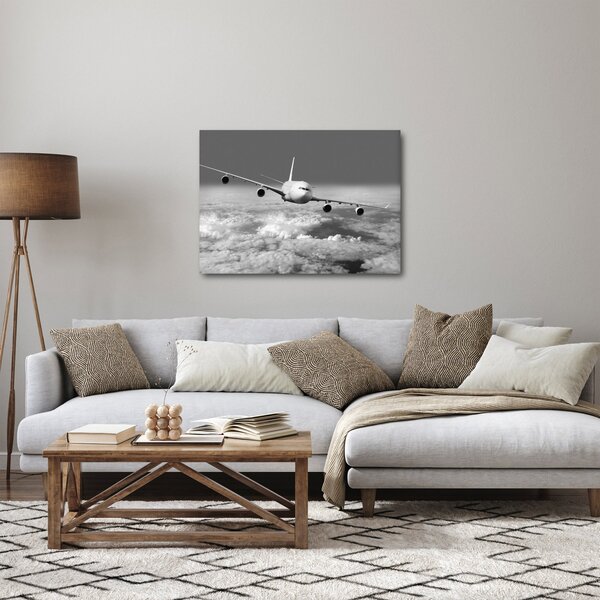 Tablou - Avion în nori, alb și negru (70x50 cm)