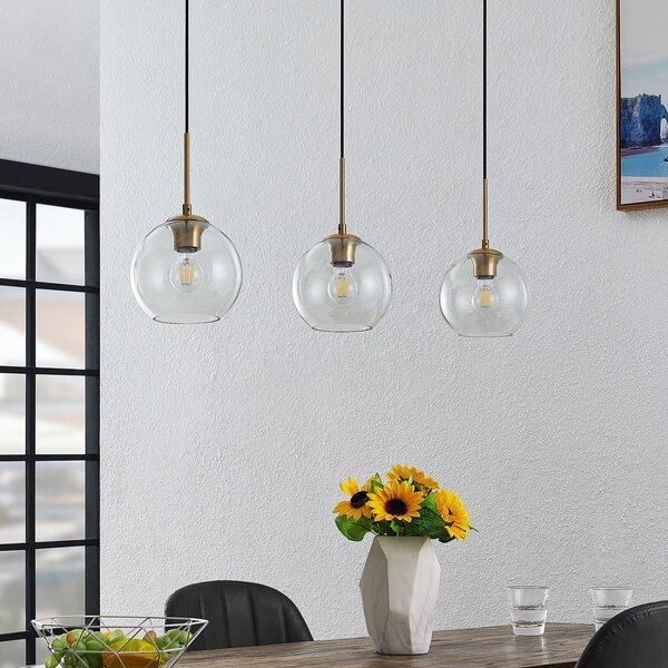 Lindby Lampă suspendată Grady, alamă/limpede, 110 cm, metal, sticlă, reglabil, Auriu / Alamă, Camera de zi / sufragerie, Metal, Modern