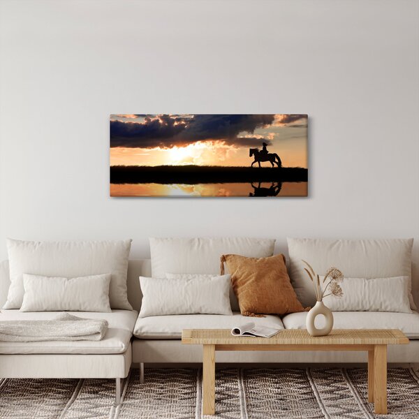 Tablou - Rider pe un cal la apus de soare (120x50 cm)