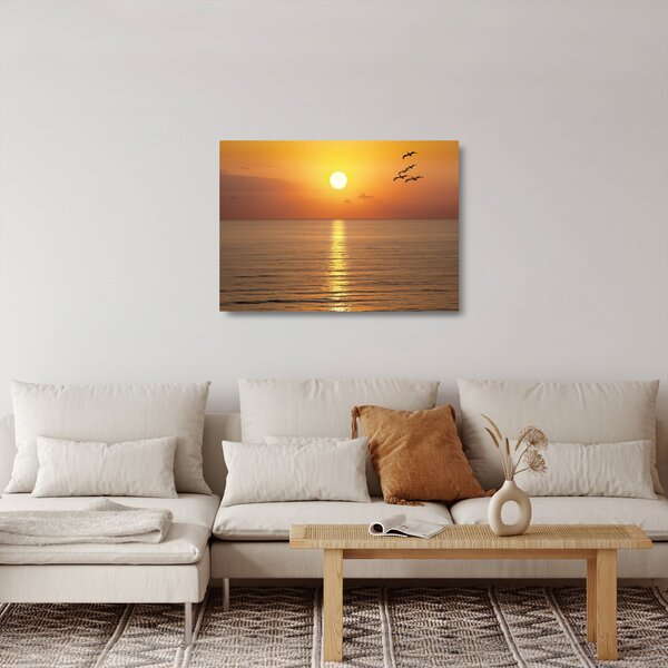 Tablou pe sticlă - Apus de soare peste ocean (70x50 cm)