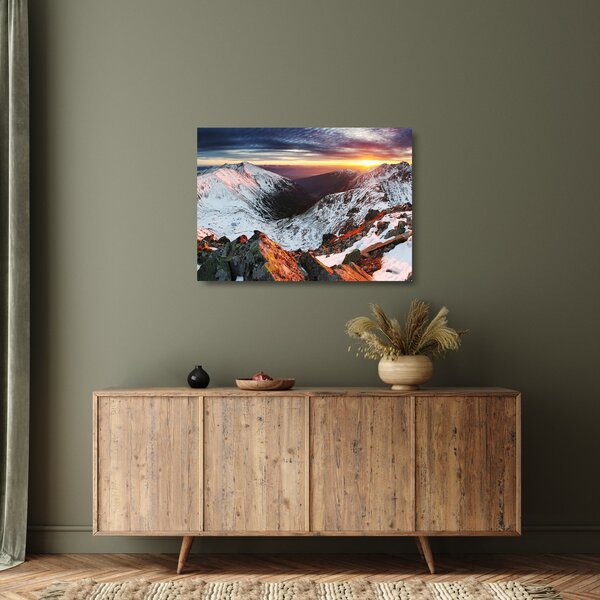 Tablou pe sticlă - Panoramă montană de iarnă (70x50 cm)
