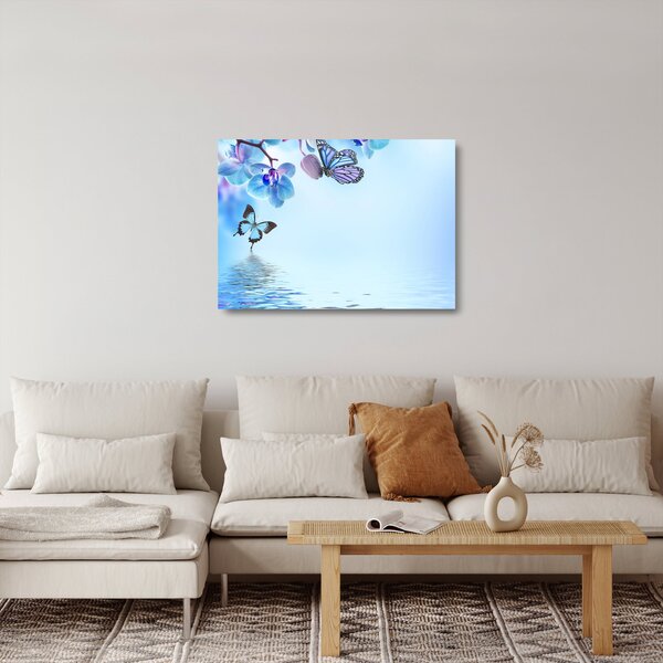 Tablou pe sticlă - Fluture pe flori de orhidee, albastru (70x50 cm)