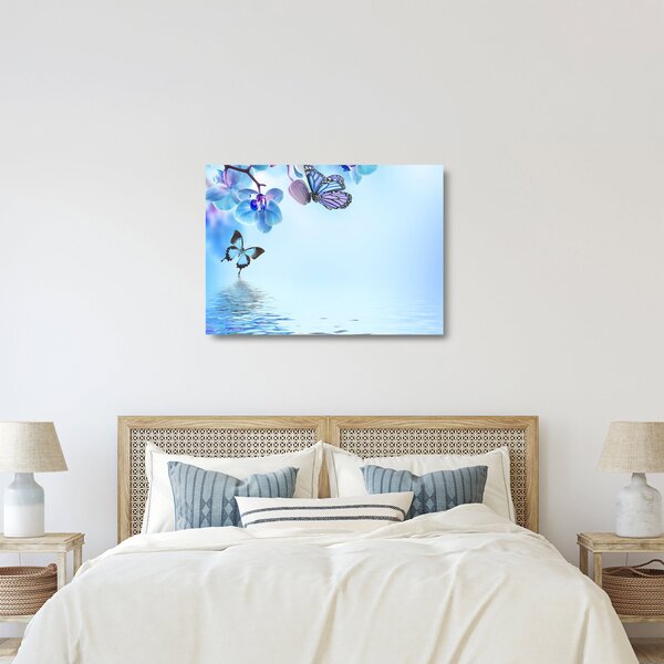Tablou pe sticlă - Fluture pe flori de orhidee, albastru (70x50 cm)