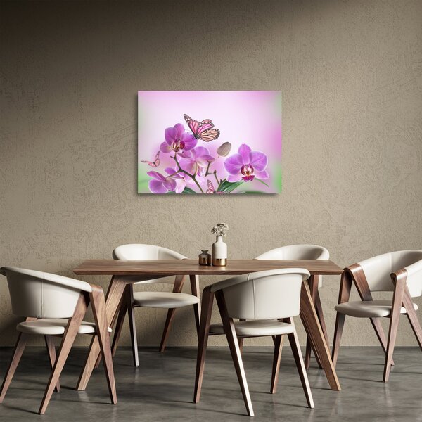 Tablou pe sticlă - Fluture pe flori de orhidee, liliac (70x50 cm)