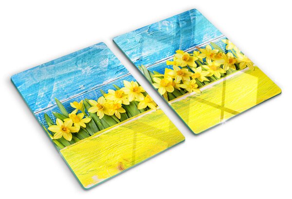 Tocător sticlă Flori de narcisă pe fundalul cerului