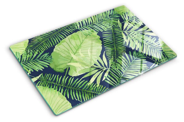 Tocător din sticlă Frunze tropicale pe un fundal întunecat