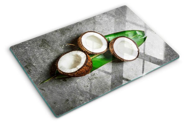 Tocător de bucătărie Nucă de cocos pe un fundal de beton