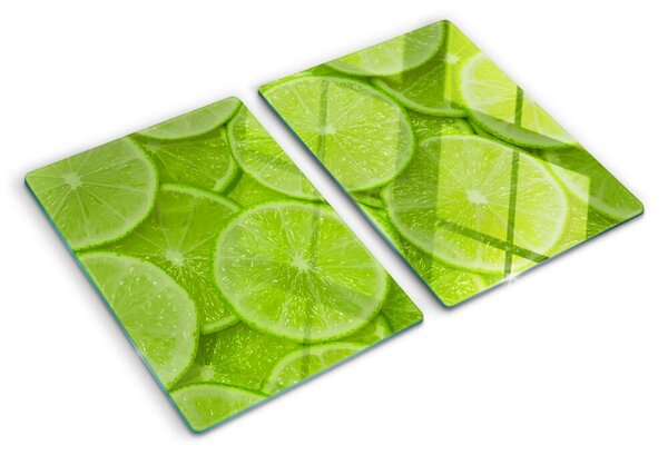 Tocător sticlă Felii de lime pe fundal verde