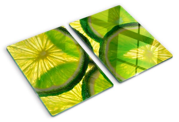 Tocător sticlă Felii de lime pe fundal verde