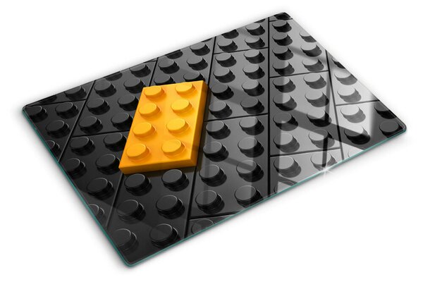 Tocător din sticlă Cărămizi LEGO pe fundal negru