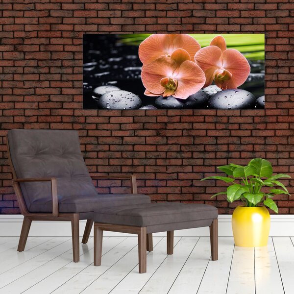 Tablou - Orhidee portocalie cu frunze de palmier (120x50 cm)