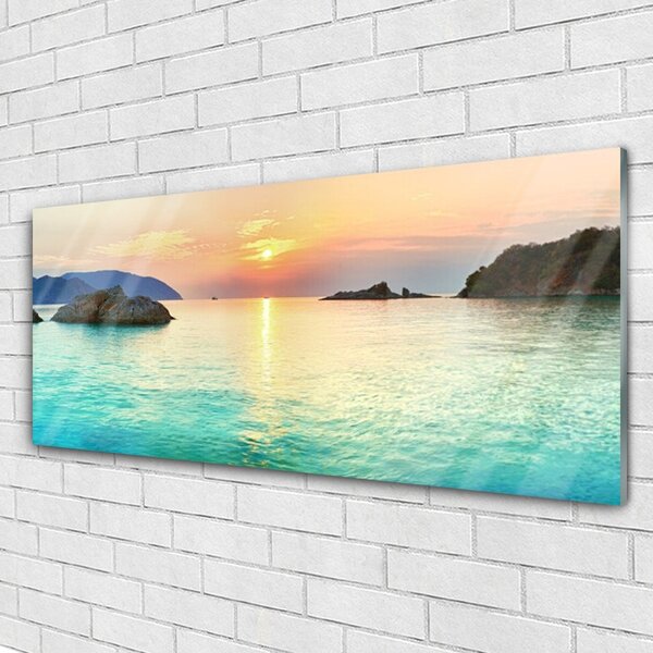 Tablou pe sticla Sea Sun Rocks Peisaj Galben Gri Albastru