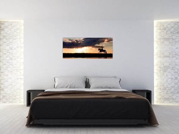 Tablou - Rider pe un cal la apus de soare (120x50 cm)