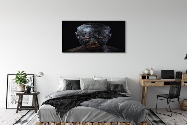 Tablouri canvas O figură chel teribil cu ochii roșii