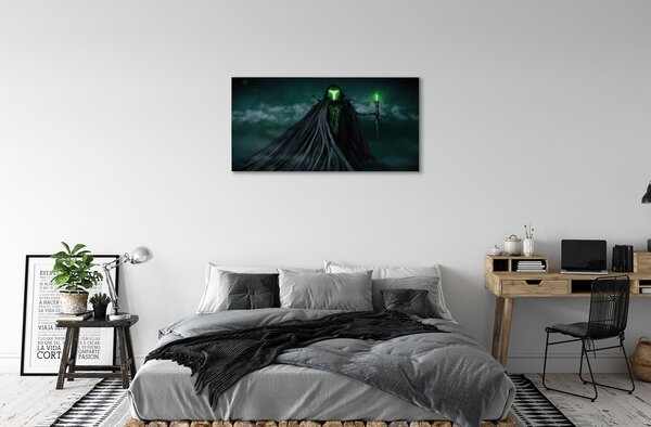 Tablouri canvas Figura întunecată de foc verde