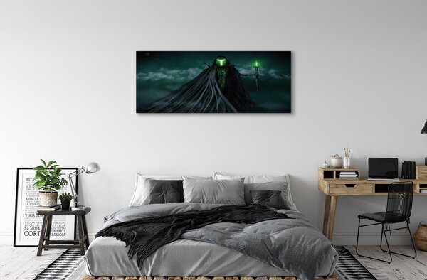 Tablouri canvas Figura întunecată de foc verde