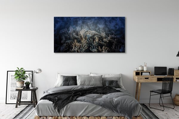 Tablouri canvas Mâinile de lumină albastră