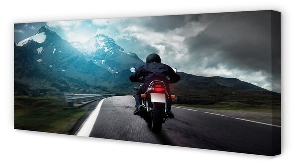 Tablouri canvas Motociclete de munte om rutier cer