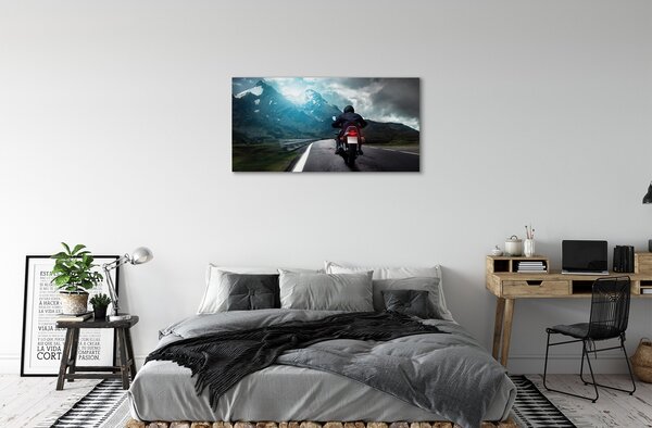 Tablouri canvas Motociclete de munte om rutier cer