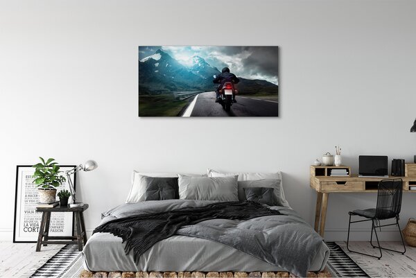 Tablouri canvas Motociclete de munte om rutier cer