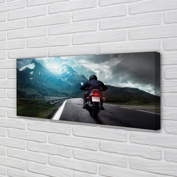 Tablouri canvas Motociclete de munte om rutier cer