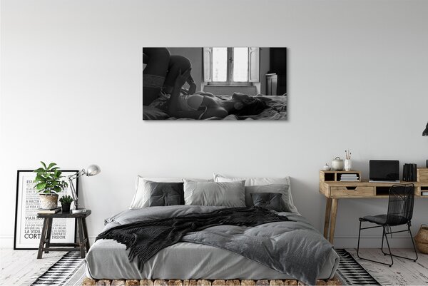 Tablouri canvas Intins femeie pe fereastra de vizualizare