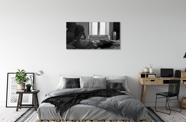 Tablouri canvas Intins femeie pe fereastra de vizualizare