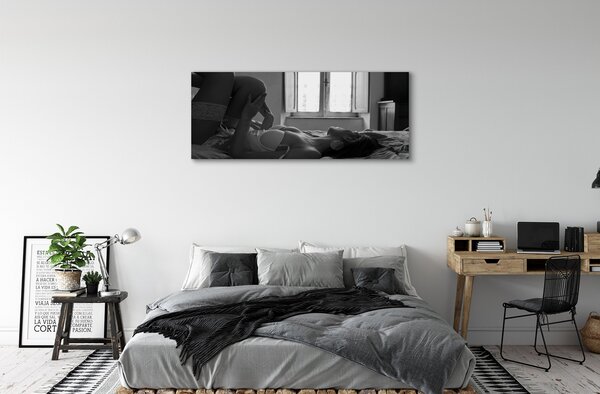 Tablouri canvas Intins femeie pe fereastra de vizualizare