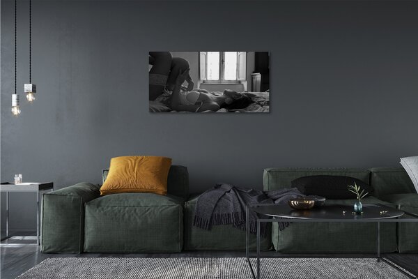 Tablouri canvas Intins femeie pe fereastra de vizualizare