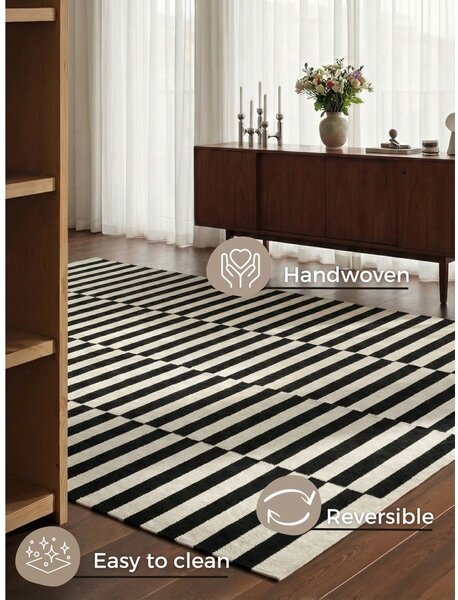 Covor negru-alb reversibil/țesut manual din lână 200x300 cm Donna – Hanse Home