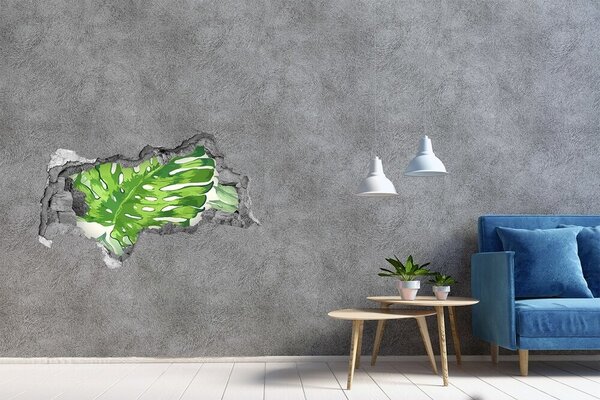 Autocolant gaură 3D Monstera verde într-o gaură de beton
