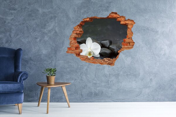 Autocolant un zid spart cu priveliște Flori și pietre pe fundalul apei