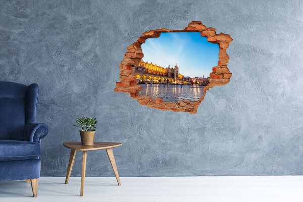 Fototapet un zid spart cu priveliște Cracovia la apus