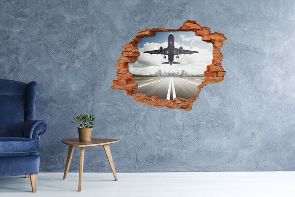 Fototapet 3D gaură în perete Avion aterizează în oraș