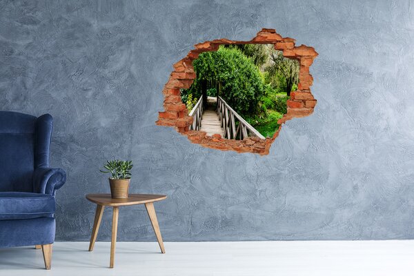 Autocolant 3D gaura cu priveliște Un paradis verde cu un pod de lemn
