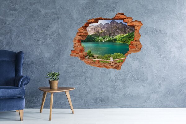 Fototapet un zid spart cu priveliște Peisaj montan lângă lac