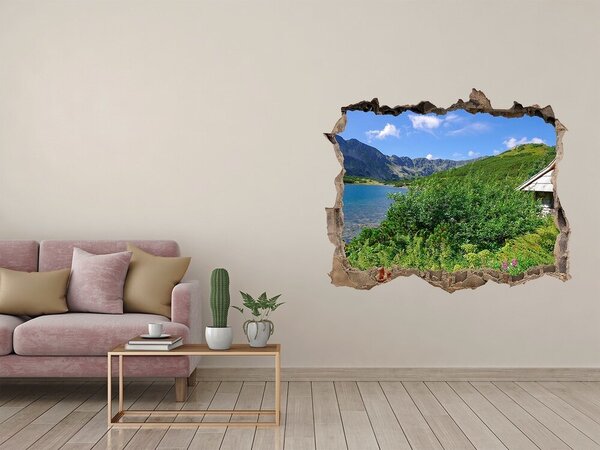 Fototapet 3D gaură în perete Peisaj montan cu un lac