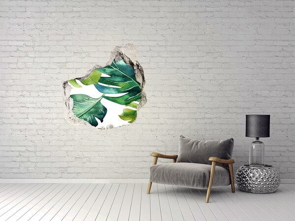 Autocolant de perete gaură 3D Frunze tropicale verzi într-un perete deteriorat