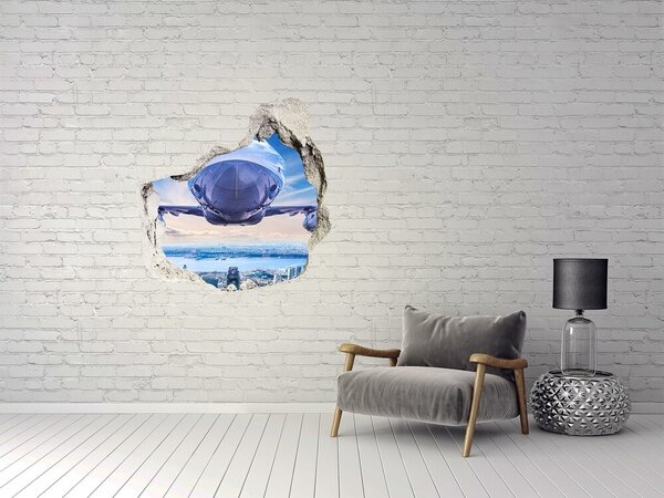 Fototapet 3D gaură în perete Un avion deasupra orașului